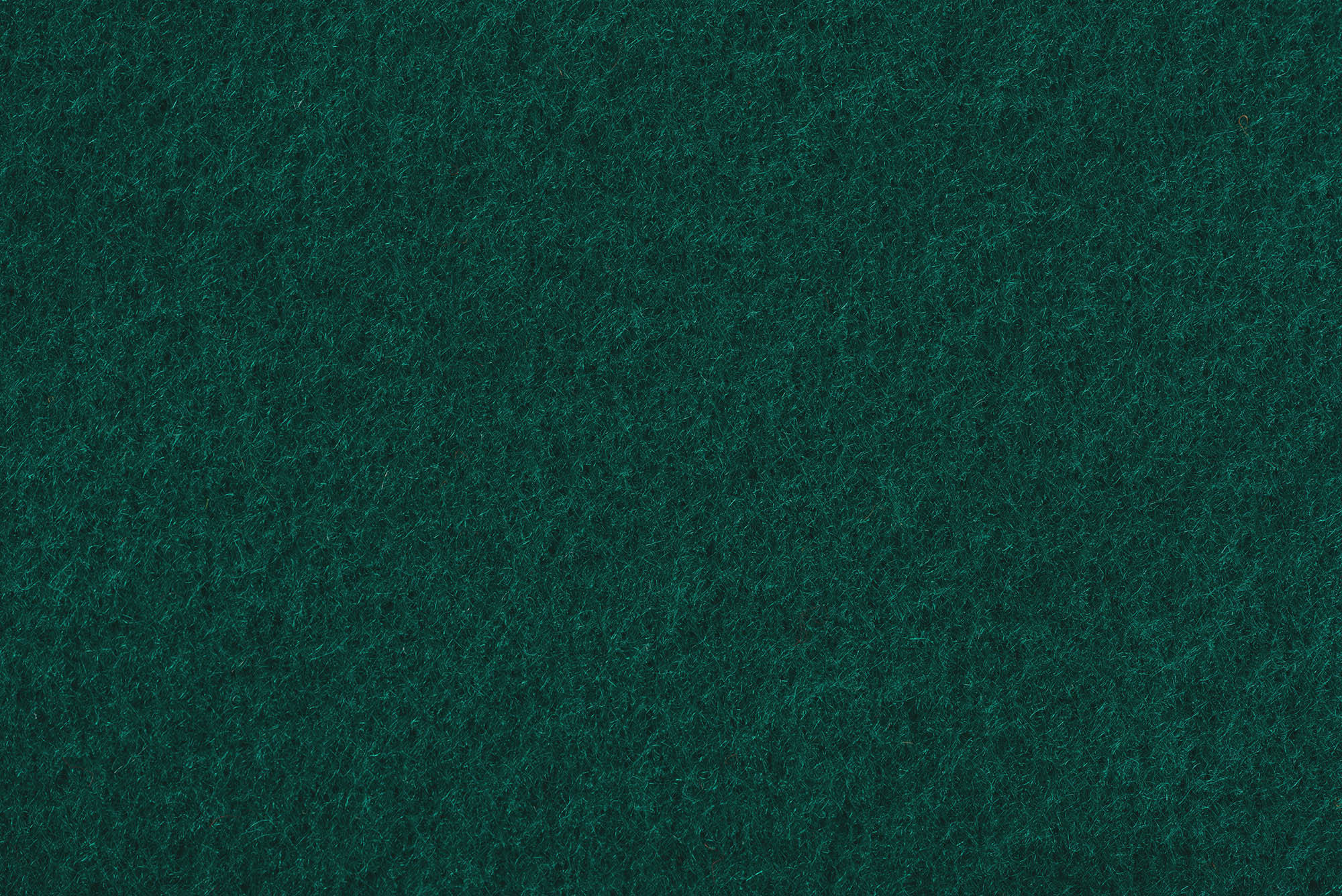 close up view of dark green felt texture | The Gammon Press